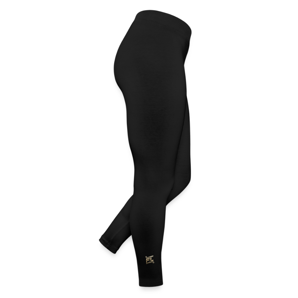 Legging noir avec logo doré subtil à la cheville dans la collection pantalons et shorts femmes