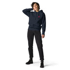 FL-FIT Hoodie unisexe noir, mockup femme face avant, logo FL rose brodé poitrine, fond blanc
