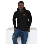 Homme portant le Hoodie Ignite noir avec logo FL-Fit brodé en orange sur le torse. Sweat à capuche streetwear premium