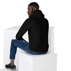 Homme de dos portant le Hoodie Ignite noir FL-Fit, montrant la coupe ajustée du sweat à capuche, assis sur des cubes blancs