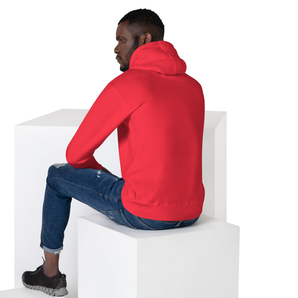 Homme de dos portant le Hoodie Ignite rouge FL-Fit, montrant la coupe ajustée du sweat à capuche, assis sur des cubes blancs