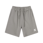 Short classique coloris gris cendré avec cordons de serrage et poches latérales.