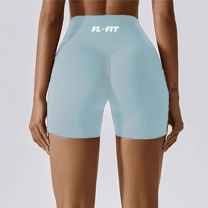 Femme portant un short Legging gainant bleu ciel FL-FIT pour femme fitness