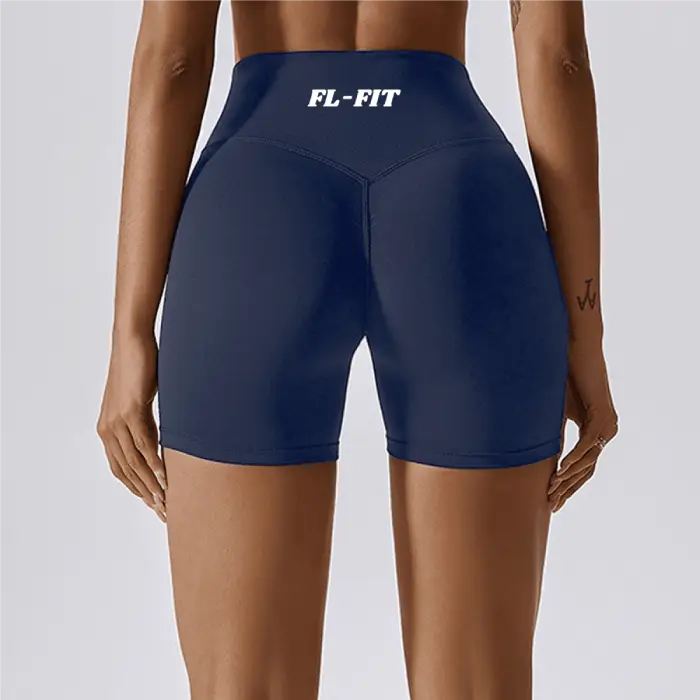 Femme portant un short Legging gainant bleu marine FL-FIT pour femme fitness