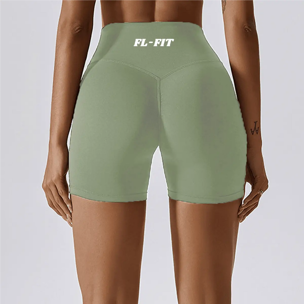 Femme portant un short Legging gainant vert olive FL-FIT pour femme fitness