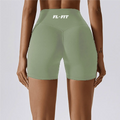 Femme portant un short Legging gainant vert olive FL-FIT pour femme fitness