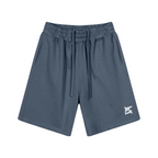 Short de détente bleu anthracite en coton, coupe ample, cordon de serrage et logo blanc FL sur le bas