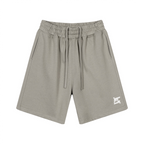 Short en coton gris taupe avec taille élastique et longs cordons de serrage